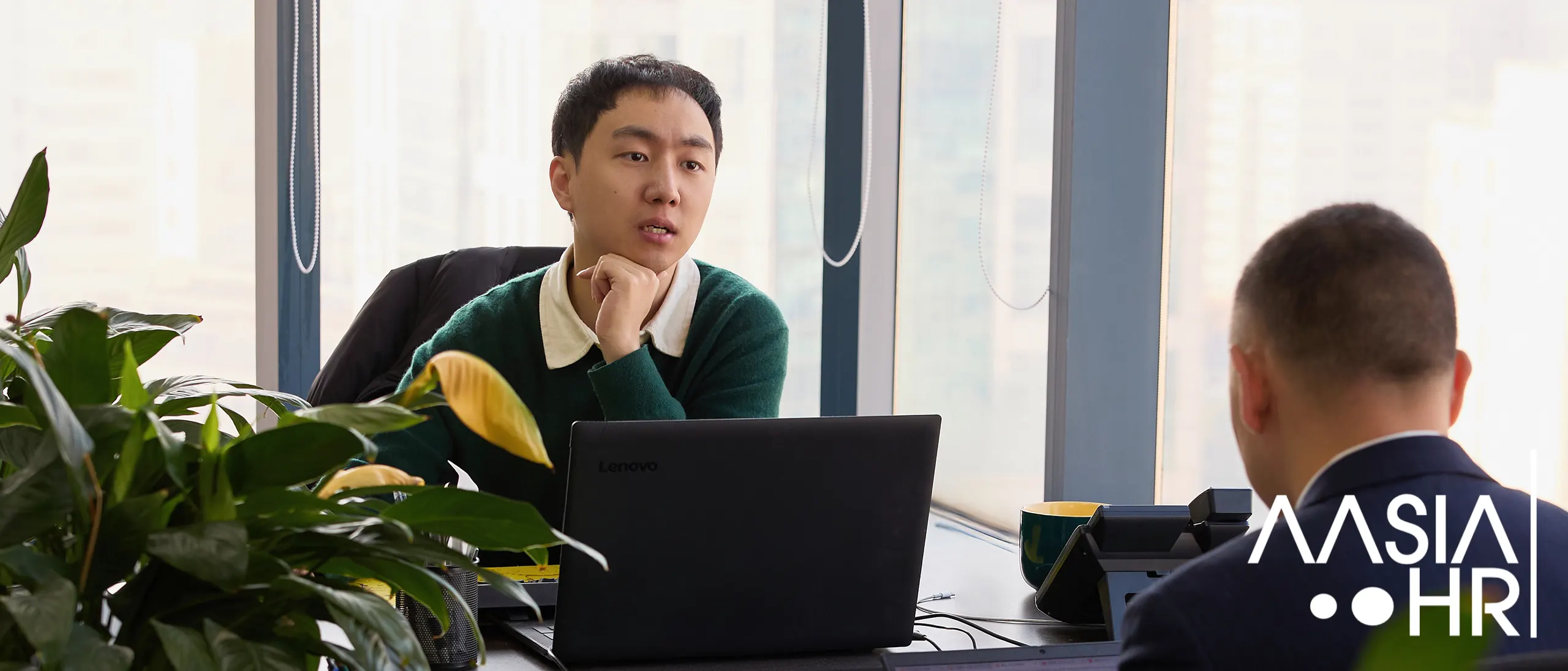 AasiaHR consultants discussing a search assignment in Shanghai office